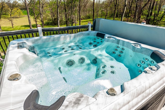 exterior space with a hot tub