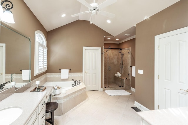 full bathroom with a bath, a stall shower, tile patterned flooring, ceiling fan, and vanity