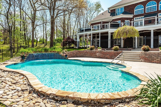 view of pool featuring fence, a patio, and a fenced in pool