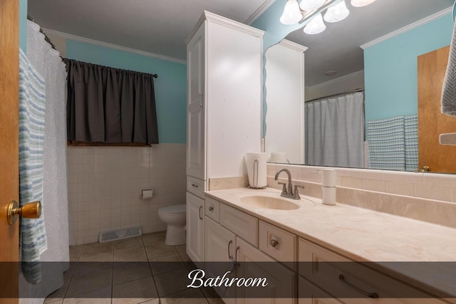 full bath with visible vents, tile patterned flooring, vanity, and ornamental molding