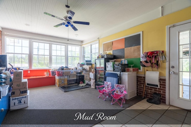 sunroom featuring tile patterned flooring