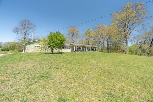 view of yard featuring a porch