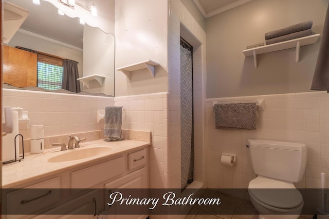 full bathroom with toilet, ornamental molding, vanity, and tile walls