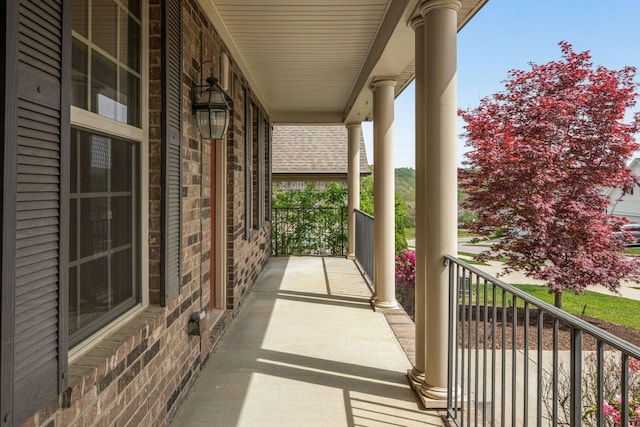 balcony featuring a porch