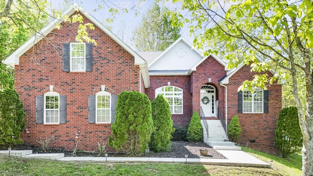 traditional-style house with brick siding