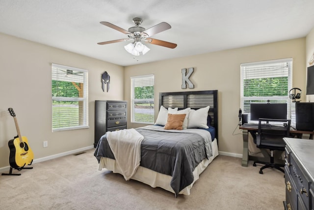 7565 N County Line Rd, Fairview, TN 37062 - bedroom with baseboards, light carpet, a ceiling fan, and visible vents