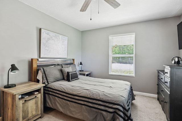 7565 N County Line Rd, Fairview, TN 37062 - bedroom with baseboards, ceiling fan, and light carpet