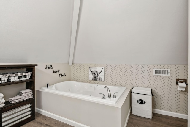 7565 N County Line Rd, Fairview, TN 37062 - full bathroom featuring a whirlpool tub, baseboards, and wood finished floors
