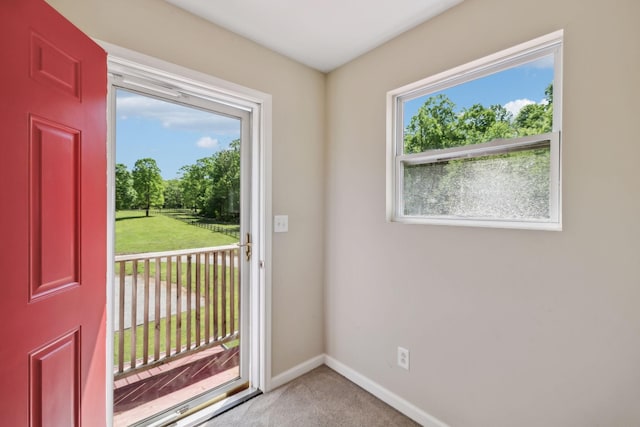 7565 N County Line Rd, Fairview, TN 37062 - doorway to outside with baseboards and carpet flooring