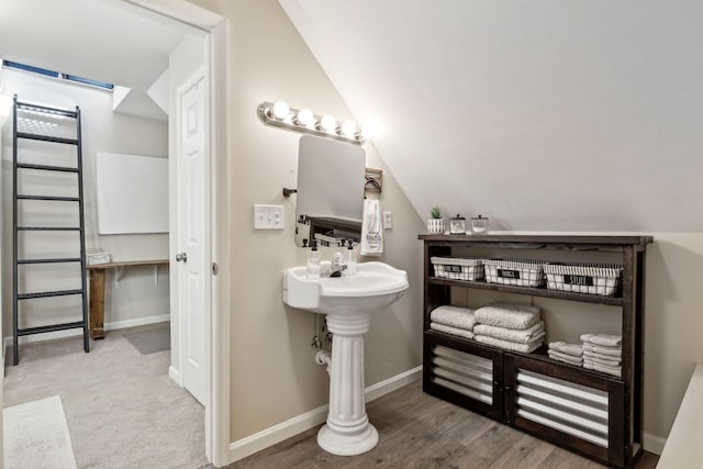 7565 N County Line Rd, Fairview, TN 37062 - bathroom featuring baseboards and wood finished floors