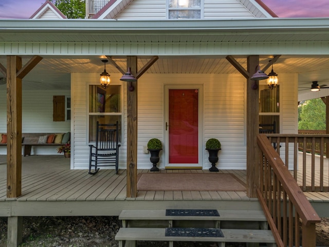 7565 N County Line Rd, Fairview, TN 37062 - exterior entry at dusk with a porch