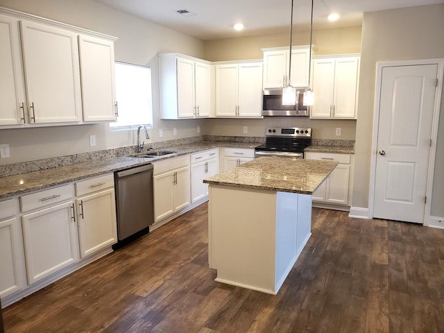 2260 Viking Ct, Murfreesboro, TN 37127 - kitchen with white cabinets, dark wood-style flooring, stainless steel appliances, and a sink