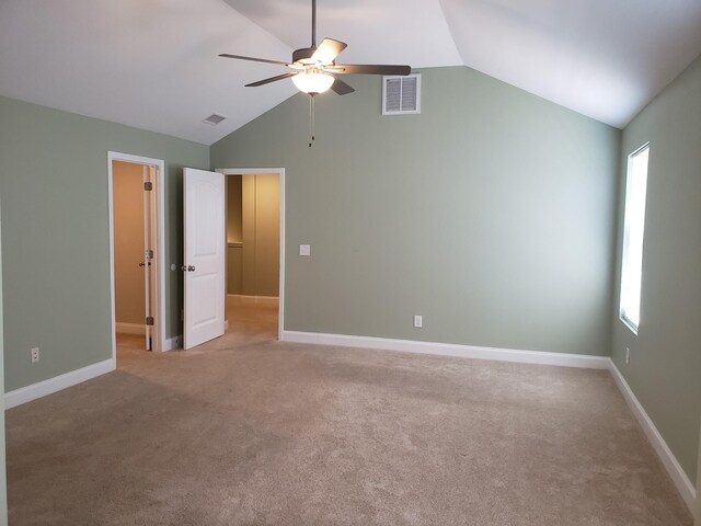 2260 Viking Ct, Murfreesboro, TN 37127 - unfurnished bedroom featuring baseboards, lofted ceiling, visible vents, and light carpet