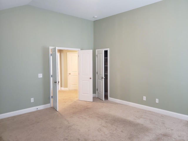 2260 Viking Ct, Murfreesboro, TN 37127 - unfurnished room with baseboards, high vaulted ceiling, and light carpet