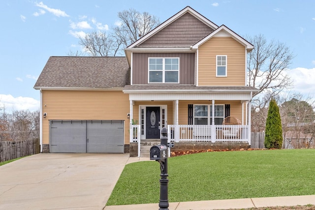 craftsman-style house with fence, covered porch, a front yard, and concrete driveway