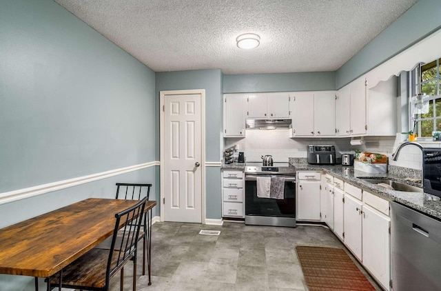 5148 Roxborough Dr, Hermitage, TN 37076 - kitchen with white cabinetry, appliances with stainless steel finishes, under cabinet range hood, and a sink