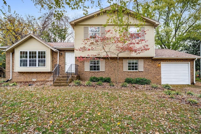 5148 Roxborough Dr, Hermitage, TN 37076 - split level home featuring an attached garage, a shingled roof, and brick siding