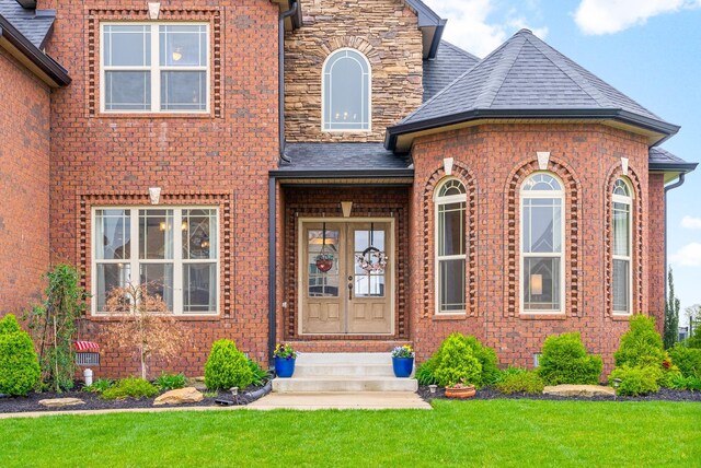 1885 Shield Dr, Clarksville, TN 37043 - view of front of property featuring brick siding and a front lawn
