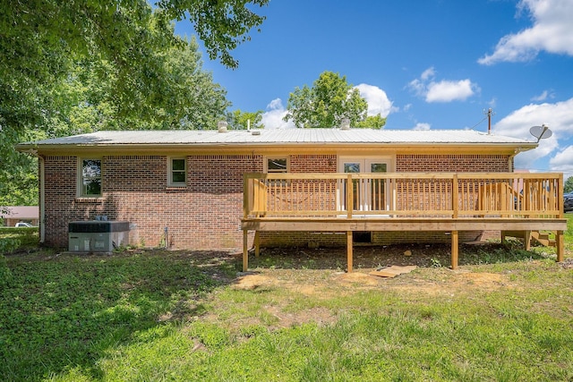 100 Hop Anderson Ln, Gainesboro, TN 38562 - rear view of house with central AC, a deck, and brick siding