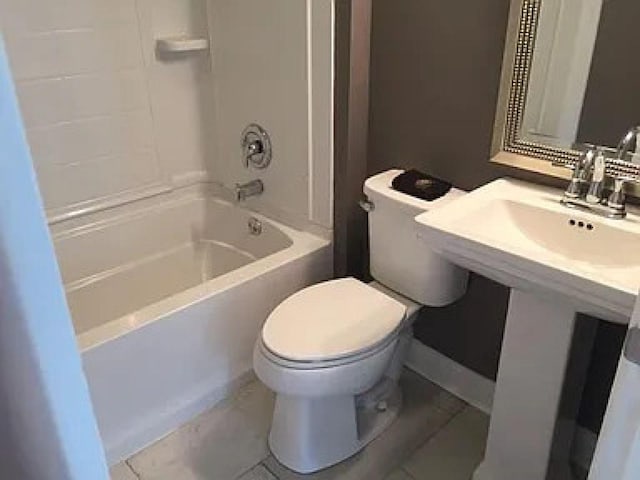 114 Hamblen Ave, Old Hickory, TN 37138 - bathroom featuring shower / bathtub combination, toilet, and tile patterned floors