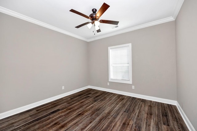 unfurnished room with dark wood-type flooring, baseboards, and ornamental molding