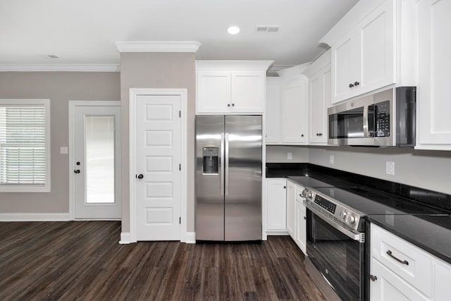 kitchen with white cabinetry, visible vents, appliances with stainless steel finishes, and dark wood-style flooring