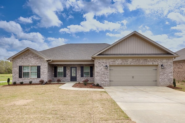 view of front facade featuring a front lawn, driveway, an attached garage, brick siding, and roof with shingles