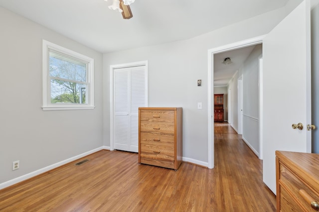 170 Wessington Pl, Hendersonville, TN 37075 - unfurnished bedroom featuring baseboards, light wood-style floors, visible vents, and a closet