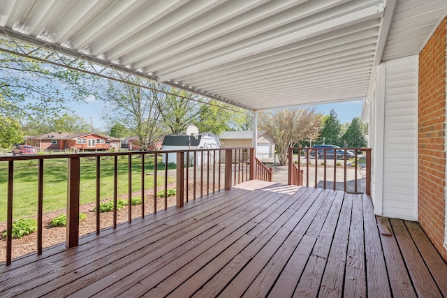 170 Wessington Pl, Hendersonville, TN 37075 - deck featuring a storage shed, a residential view, a lawn, and an outdoor structure