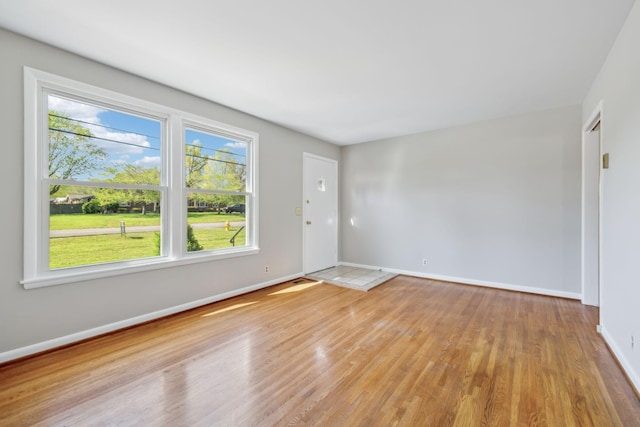 170 Wessington Pl, Hendersonville, TN 37075 - unfurnished living room with baseboards and light wood-style floors