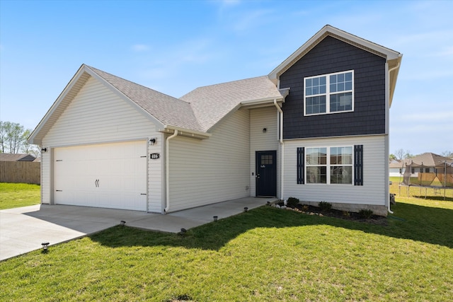 406 Bender Ct, Clarksville, TN 37042 - view of front of house featuring an attached garage, a front yard, fence, and driveway