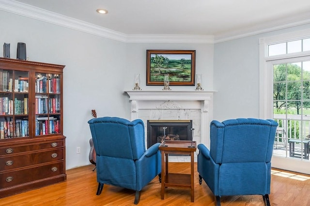 1319 N Plantation Dr, Cookeville, TN 38506 - sitting room with ornamental molding, wood finished floors, recessed lighting, and a high end fireplace