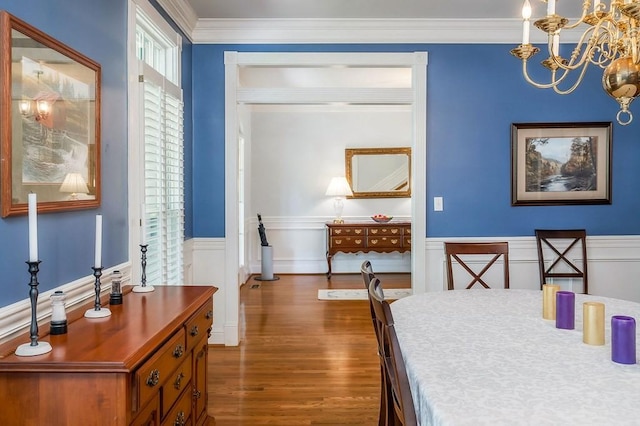 1319 N Plantation Dr, Cookeville, TN 38506 - dining space with wainscoting, a chandelier, dark wood-type flooring, and crown molding