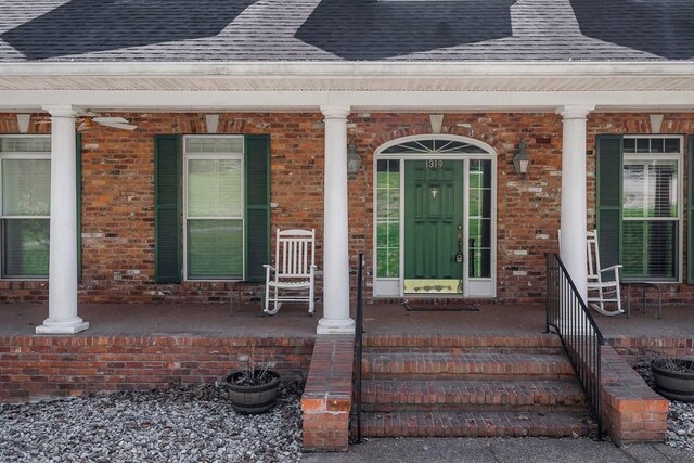 1319 N Plantation Dr, Cookeville, TN 38506 - entrance to property featuring a porch and a shingled roof
