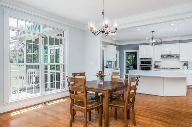 1319 N Plantation Dr, Cookeville, TN 38506 - dining space featuring light wood-style flooring, an inviting chandelier, recessed lighting, and crown molding