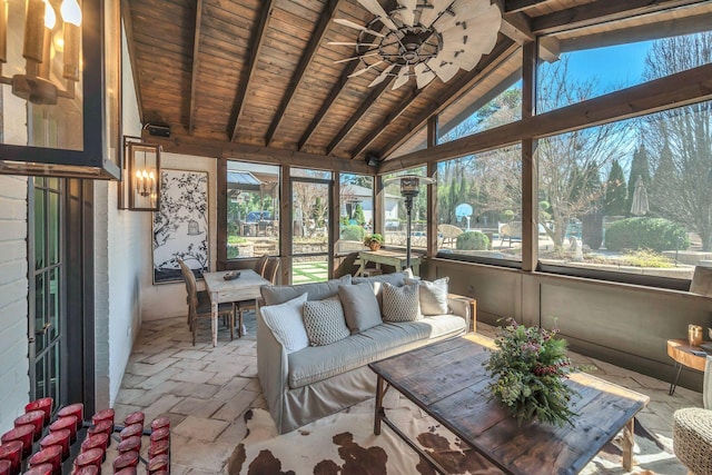 sunroom / solarium featuring an outdoor living space, vaulted ceiling with beams, wooden ceiling, and ceiling fan