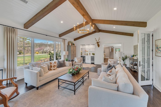 living room with lofted ceiling with beams, wood finished floors, recessed lighting, and a chandelier