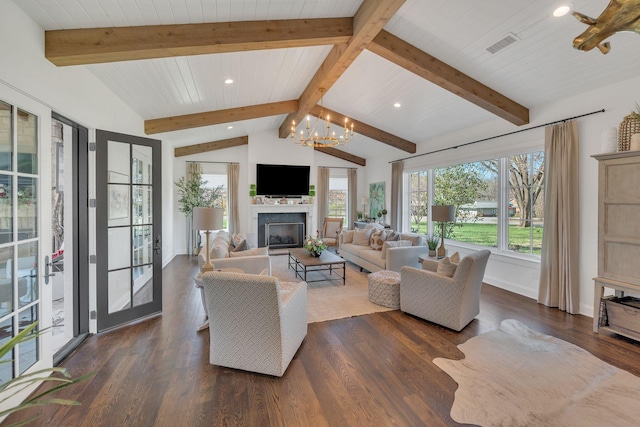living room with dark wood-style floors, a wealth of natural light, and recessed lighting