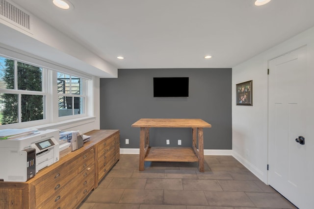 interior space with recessed lighting, visible vents, and baseboards