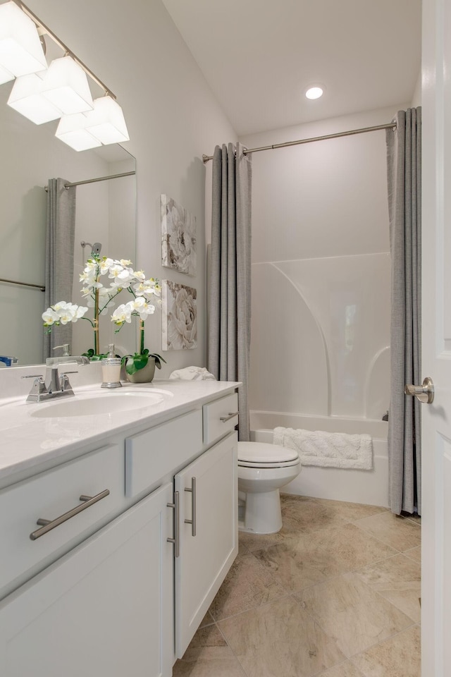 bathroom featuring recessed lighting, toilet, vanity, and shower / bathtub combination with curtain