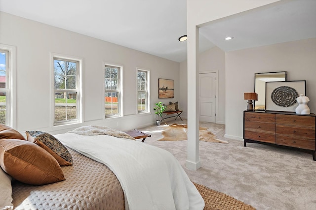 carpeted bedroom featuring recessed lighting and baseboards