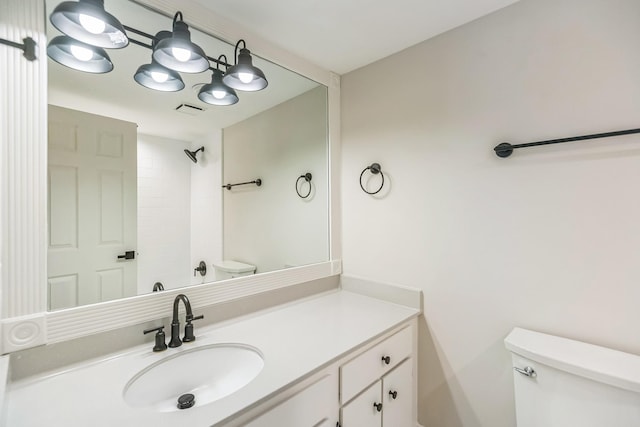 full bath with visible vents, toilet, and vanity