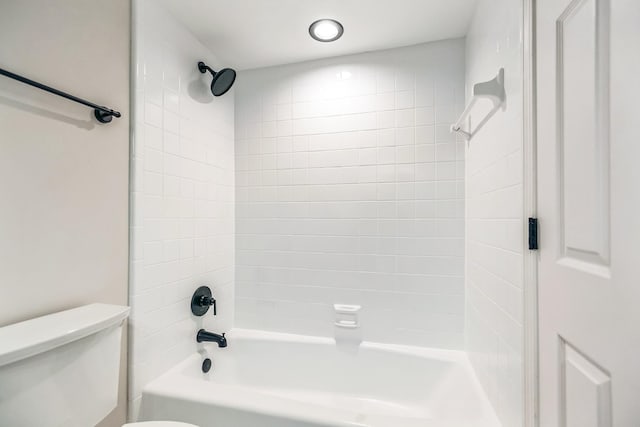 full bathroom featuring washtub / shower combination and toilet
