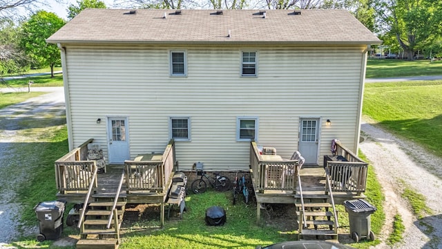 524 Woods Dr, Columbia, TN 38401 - back of house featuring a wooden deck, a yard, a shingled roof, and stairs