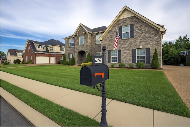 2521 Pebblecreek Ln, Murfreesboro, TN 37130 - view of front of property with a front lawn, stone siding, and a garage