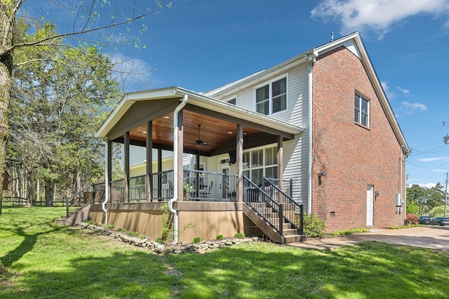 313 Walpole Ct, Nolensville, TN 37135 - traditional-style house featuring a front lawn, a ceiling fan, a porch, and stairs