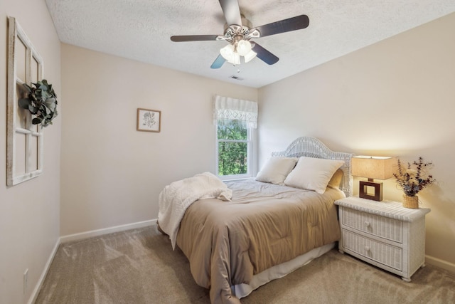 313 Walpole Ct, Nolensville, TN 37135 - bedroom with a textured ceiling, visible vents, baseboards, light colored carpet, and a ceiling fan