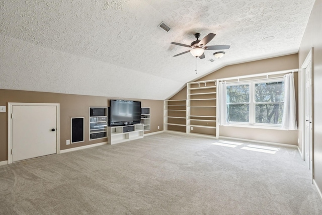 313 Walpole Ct, Nolensville, TN 37135 - unfurnished living room featuring a textured ceiling, visible vents, carpet, built in shelves, and ceiling fan
