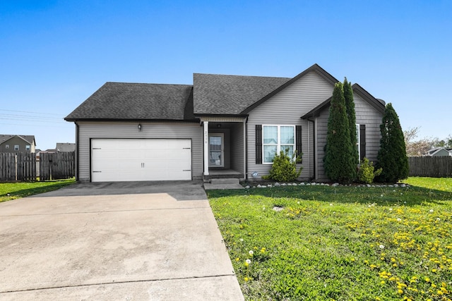2330 Spike Ct, Clarksville, TN 37040 - ranch-style home featuring an attached garage, concrete driveway, a front yard, and fence
