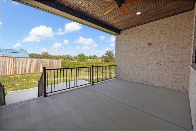 exterior space featuring a ceiling fan